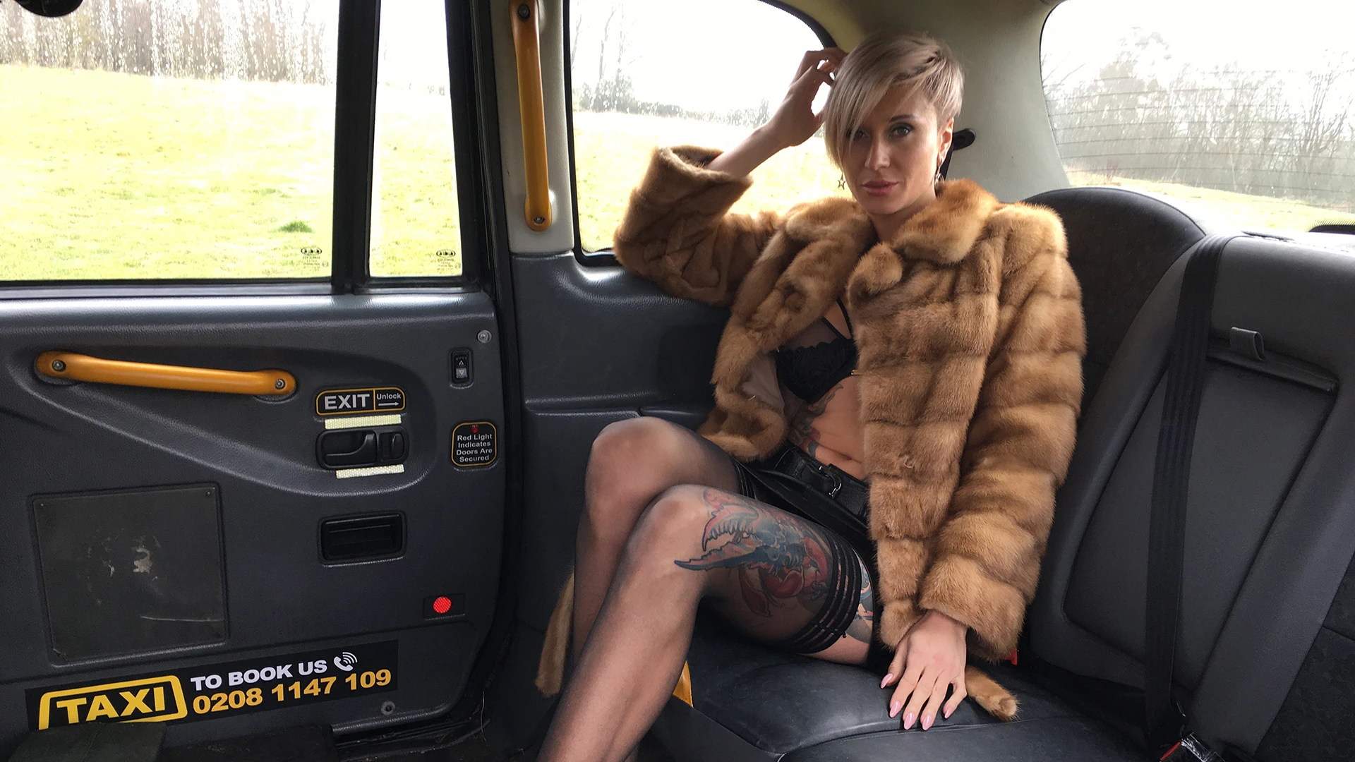 Short haired tattooed blonde fucked