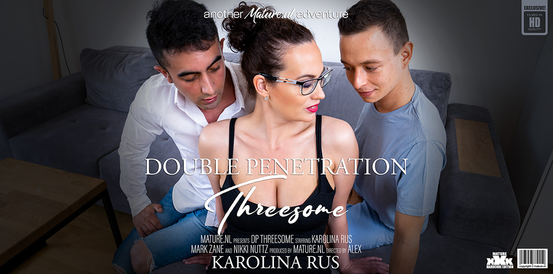 A double penetrating threesome with two young guys and MILF Karolina Rus